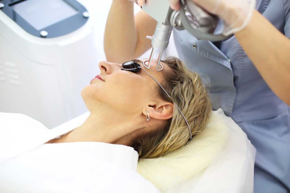 patient receiving laser resurfacing treatment